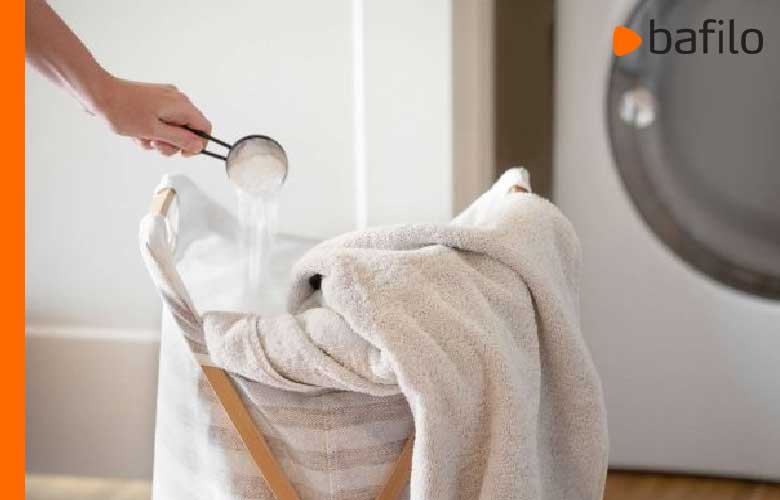 چگونه با سرکه و جوش شیرین ماشین لباسشویی را تمیز کنیم؟